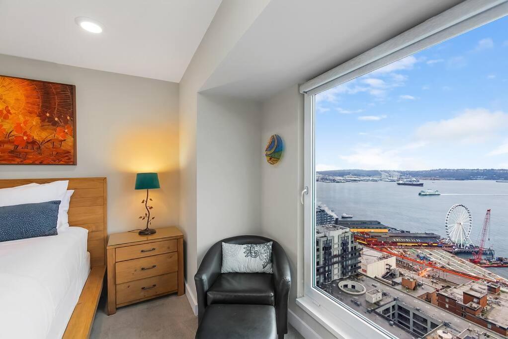 Newmark Tower's Water Wheel With Sea Views Seattle